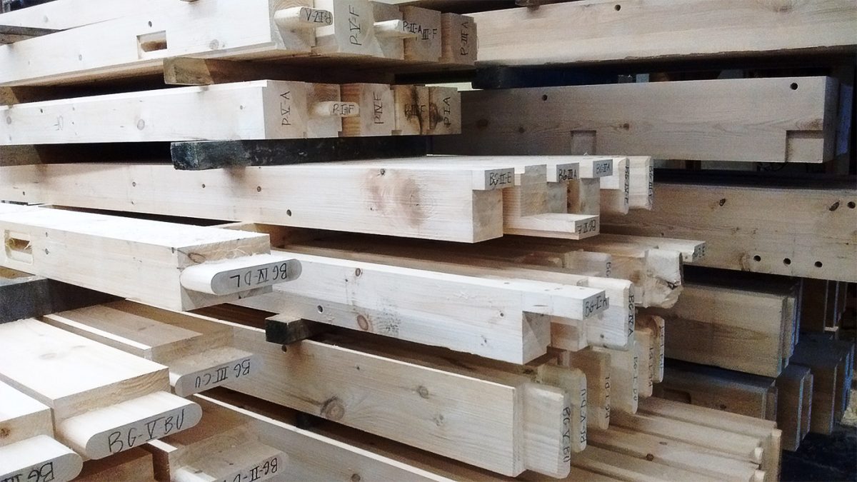 Every timber and beam is precisely trimmed and numbered for later assembly onsite.