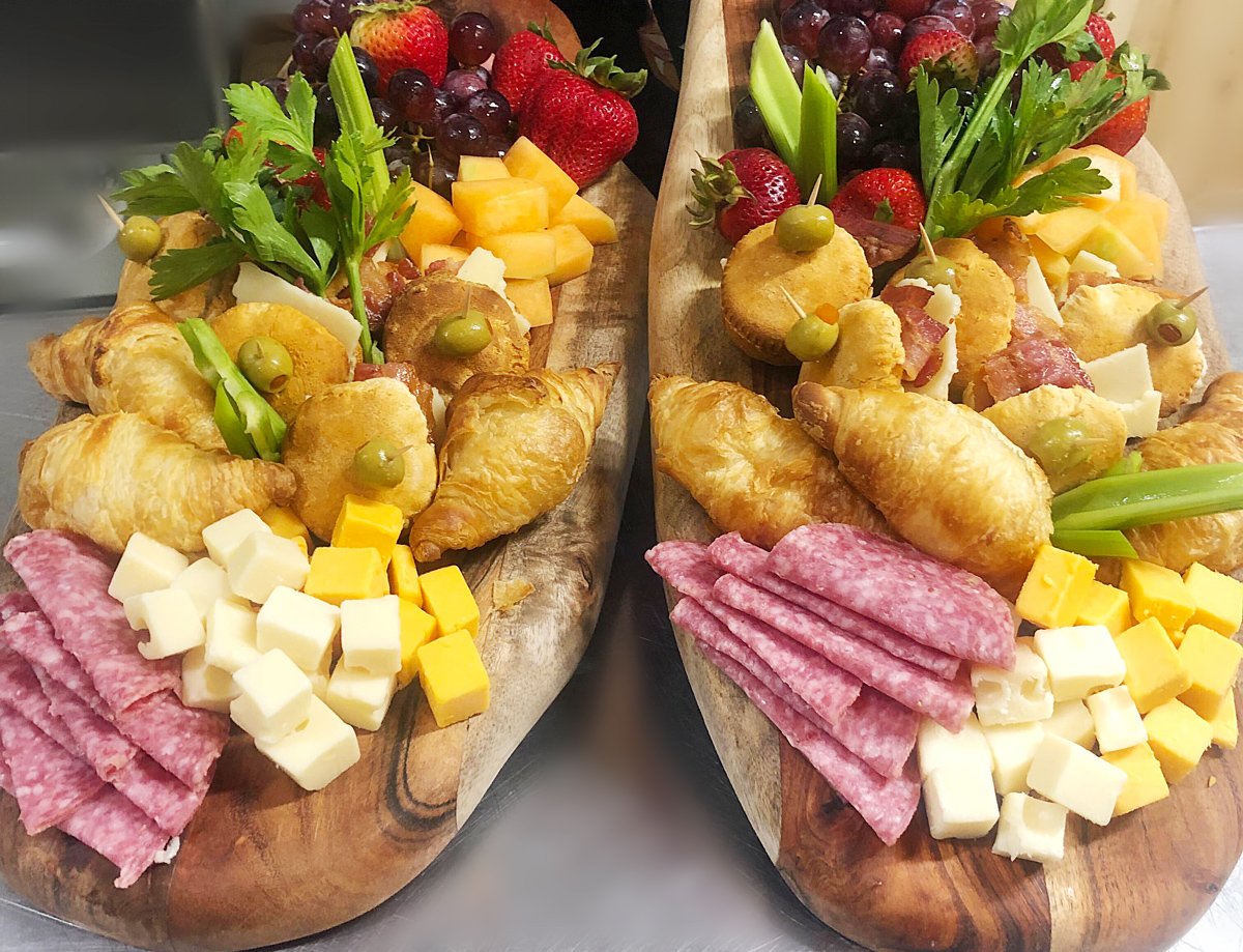 Breakfast charcuterie Boards with mini croissant sandwiches